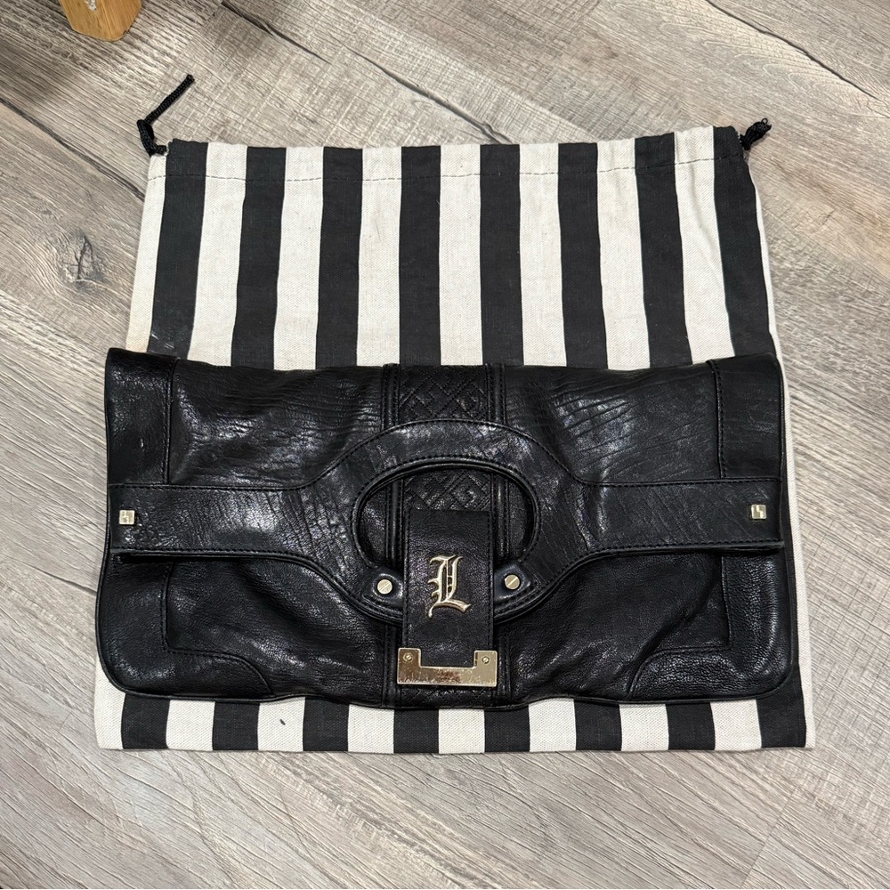 Gwen Stefani L.A.M.B fold over clutch